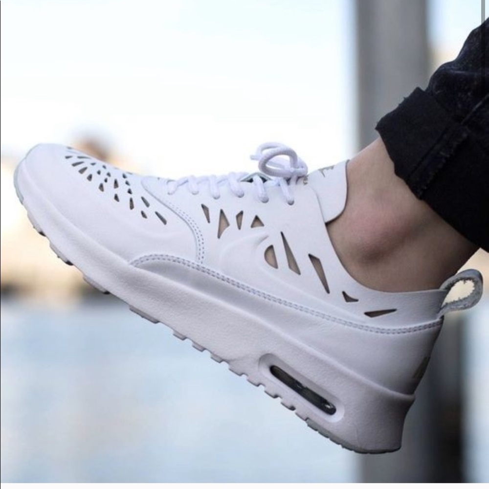 Nike Thea later cut sneakers in white